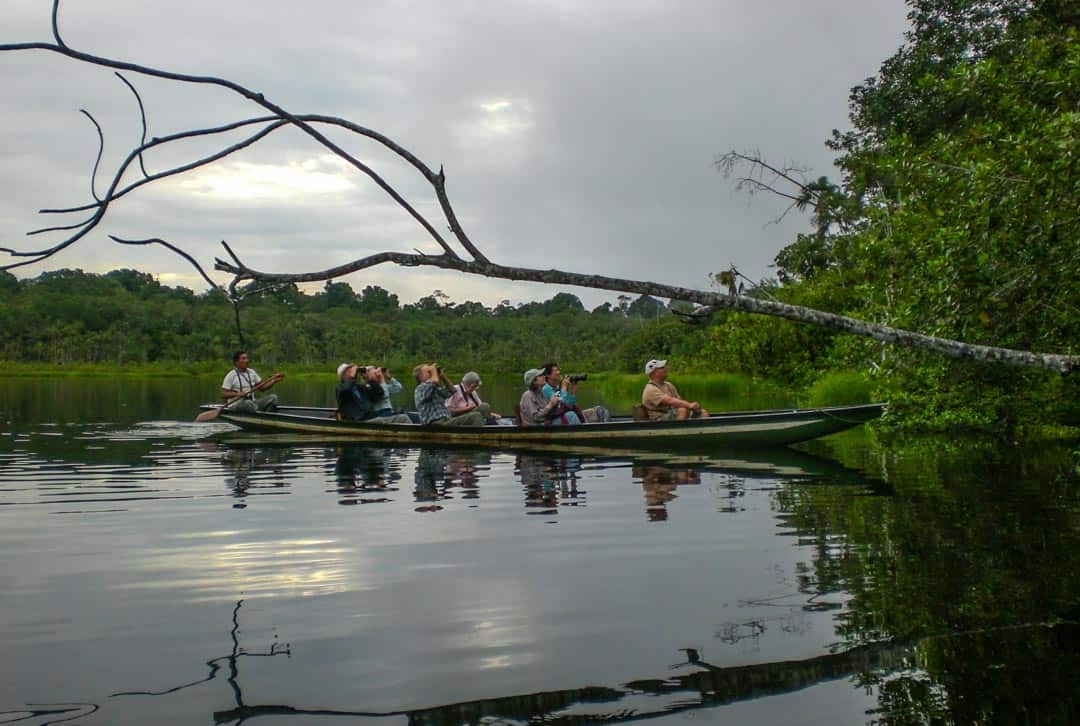 Late afternoon canoe rides are a highlight of an Amazon rainforest trip.