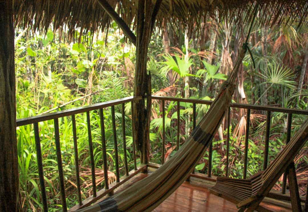 Hammocks on the porch is part of the fun when visiting Ecuador's Amazon jungle at Sacha Lodge.
