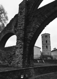 View towards Chiesa Santa Maria Maggiore through the ancient buttresses of Basilica di San Vitale, Ravenna, Italy