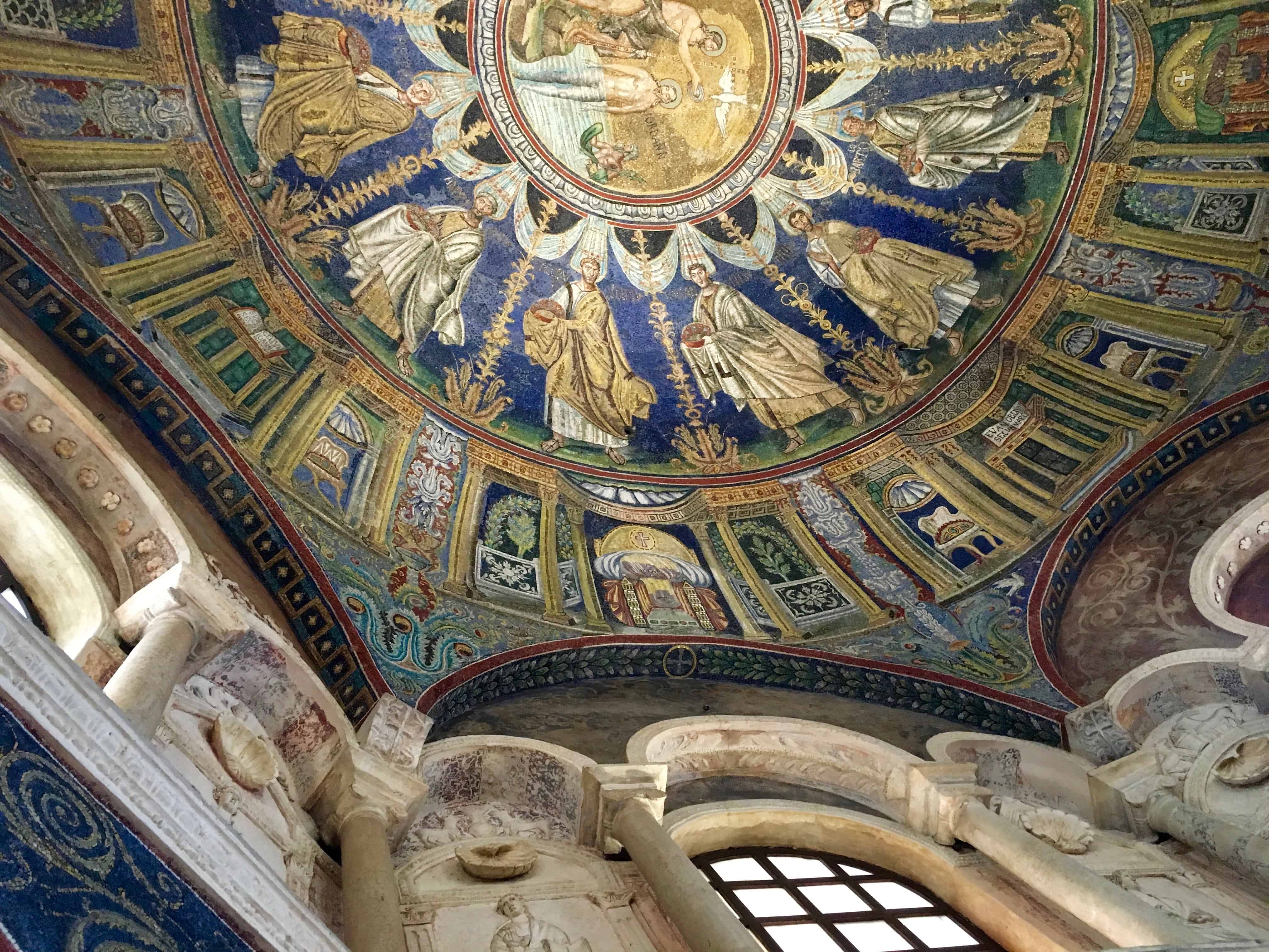 Exquisite mosaic ceiling and marble walls in the Battistero Neoniano, Ravenna, Italy