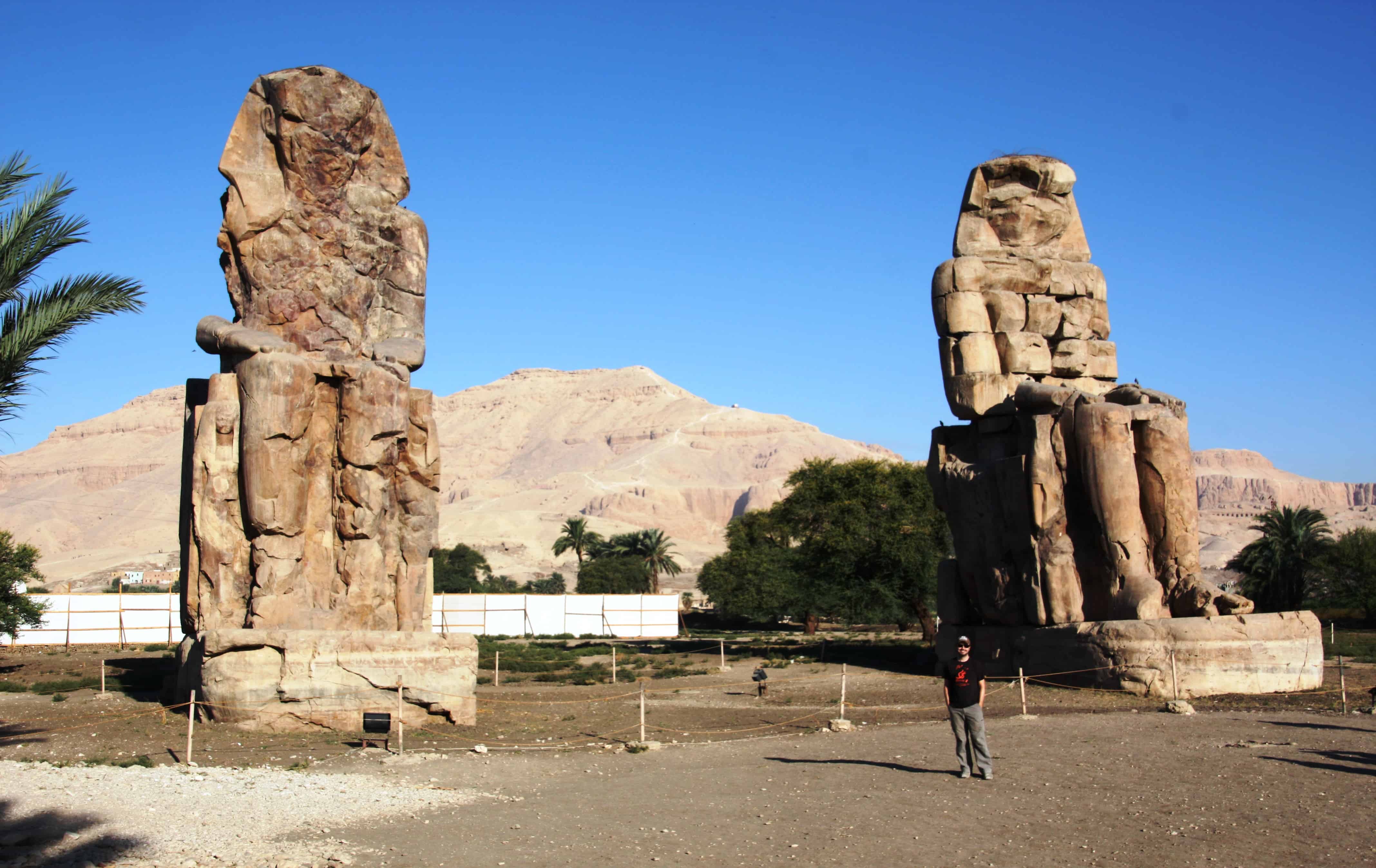 The giant Colossi of Memnon guard what was once the entryway to the vast mortuary temple of Amenhotep III.