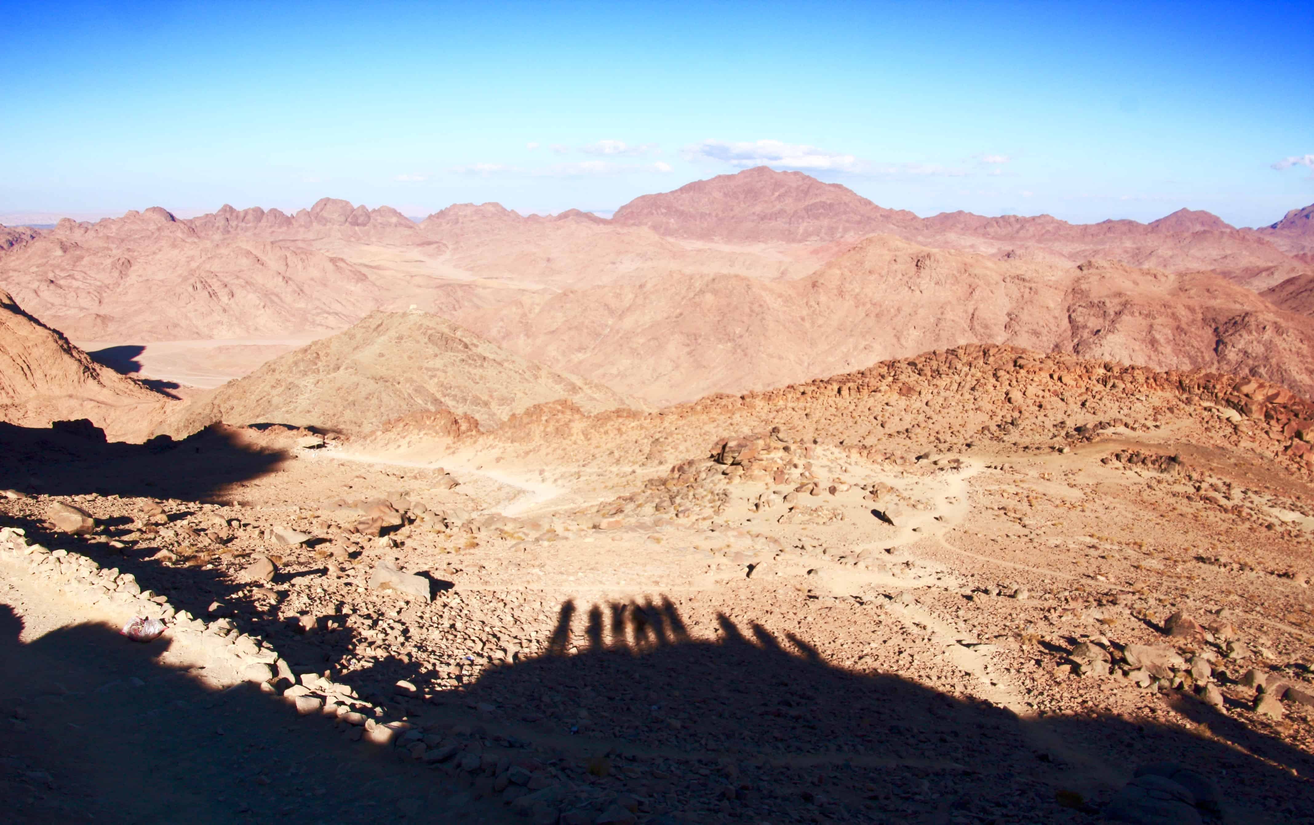 Silhouetted hikers on the trail up Mount Sinai, Egypt