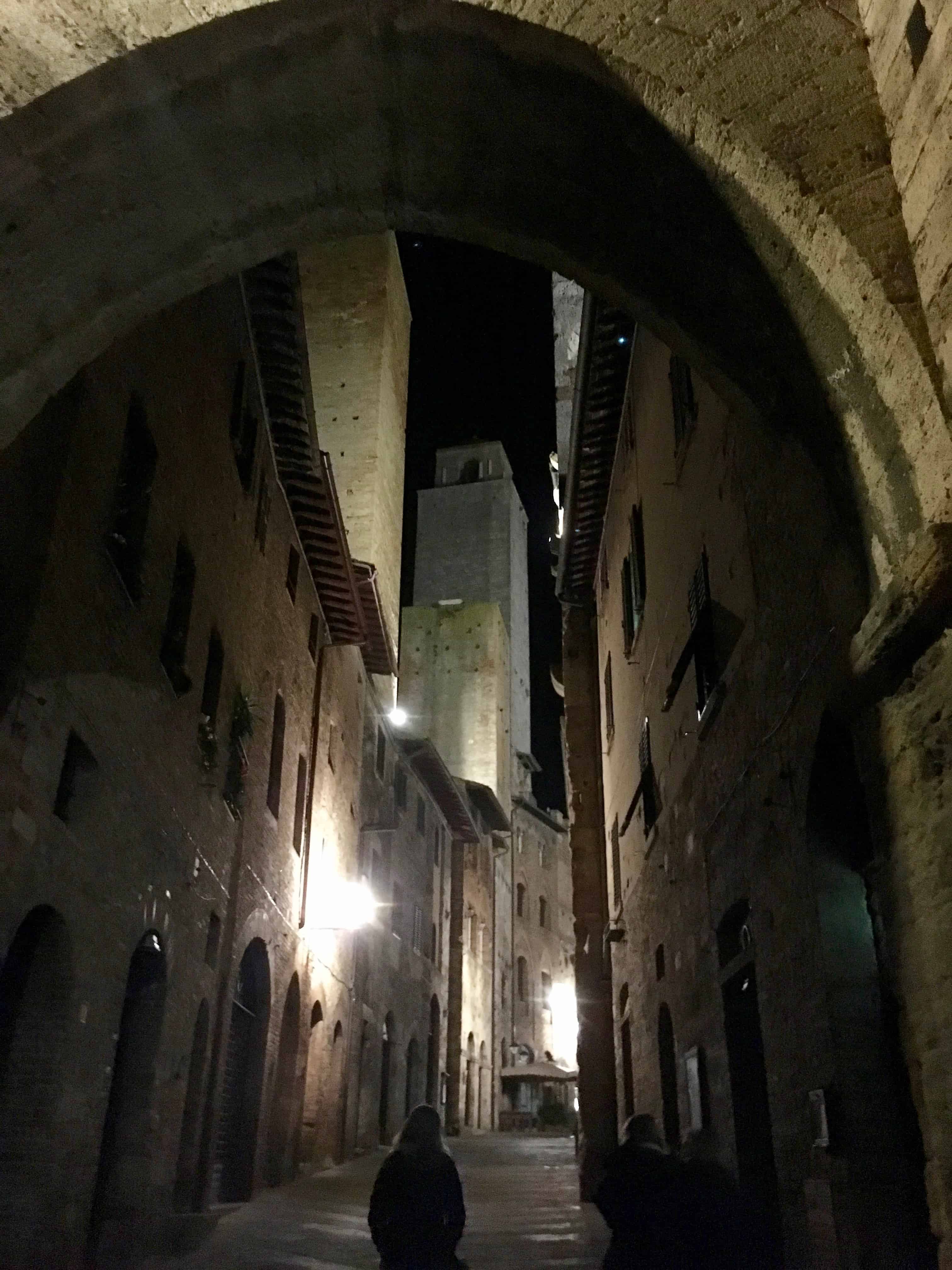 Streetscape by night in San Gimignano, Italy