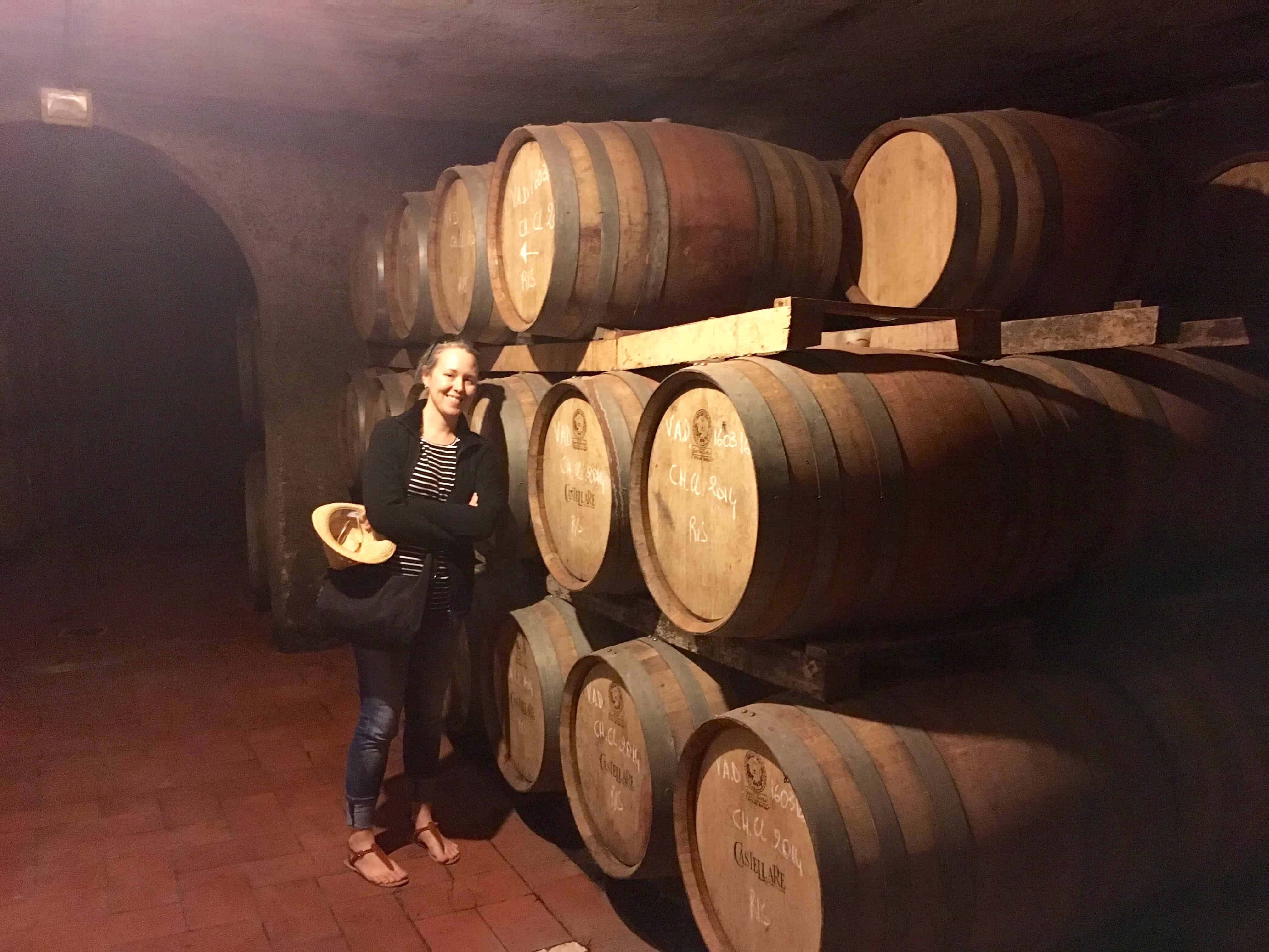 Wine barrels at Castellina Winery in Chianti, Italy