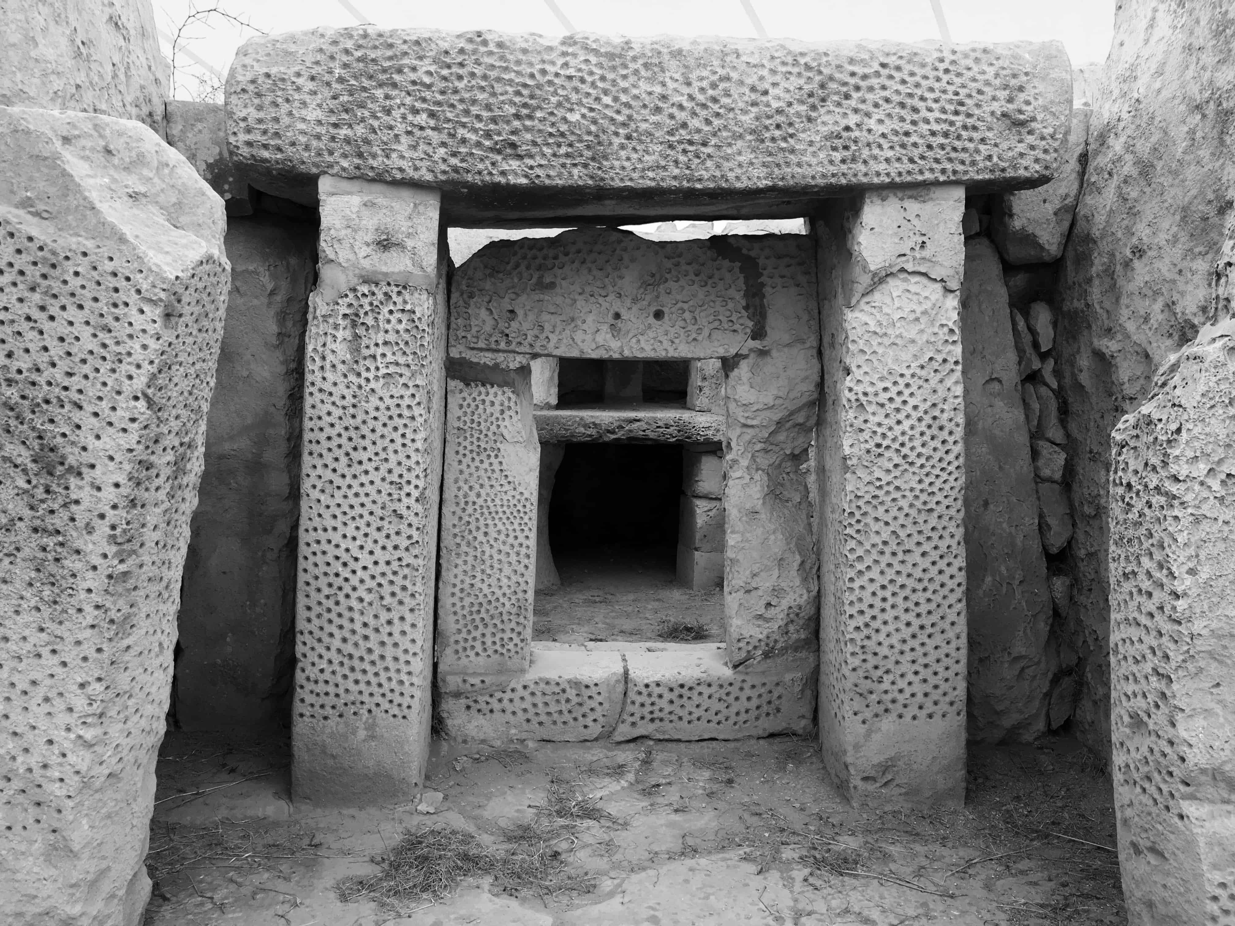 Patterned stone gateway at the megalithic temple, Hagar Qim, in Malta.