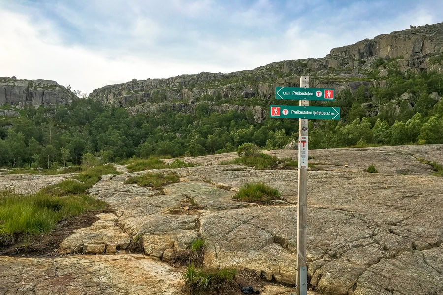 Signs show the way while hiking Pulpit Rock.