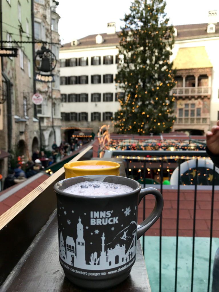 Warm mugs of gluwhein at the Innsbruck Christmas Market in the Old Town.