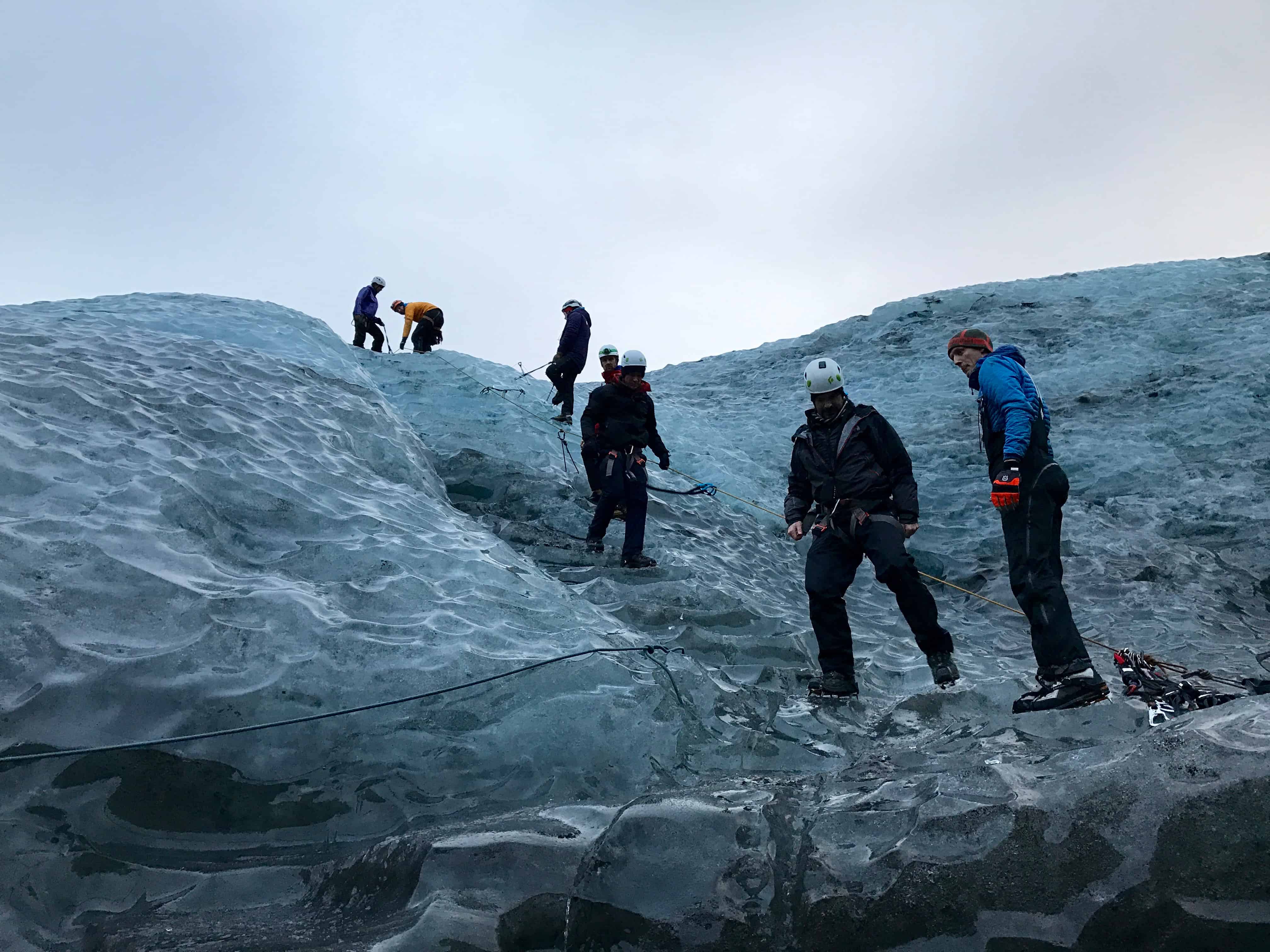 Ropes and crampons for the descent into Waterfall Ice Cave, Iceland