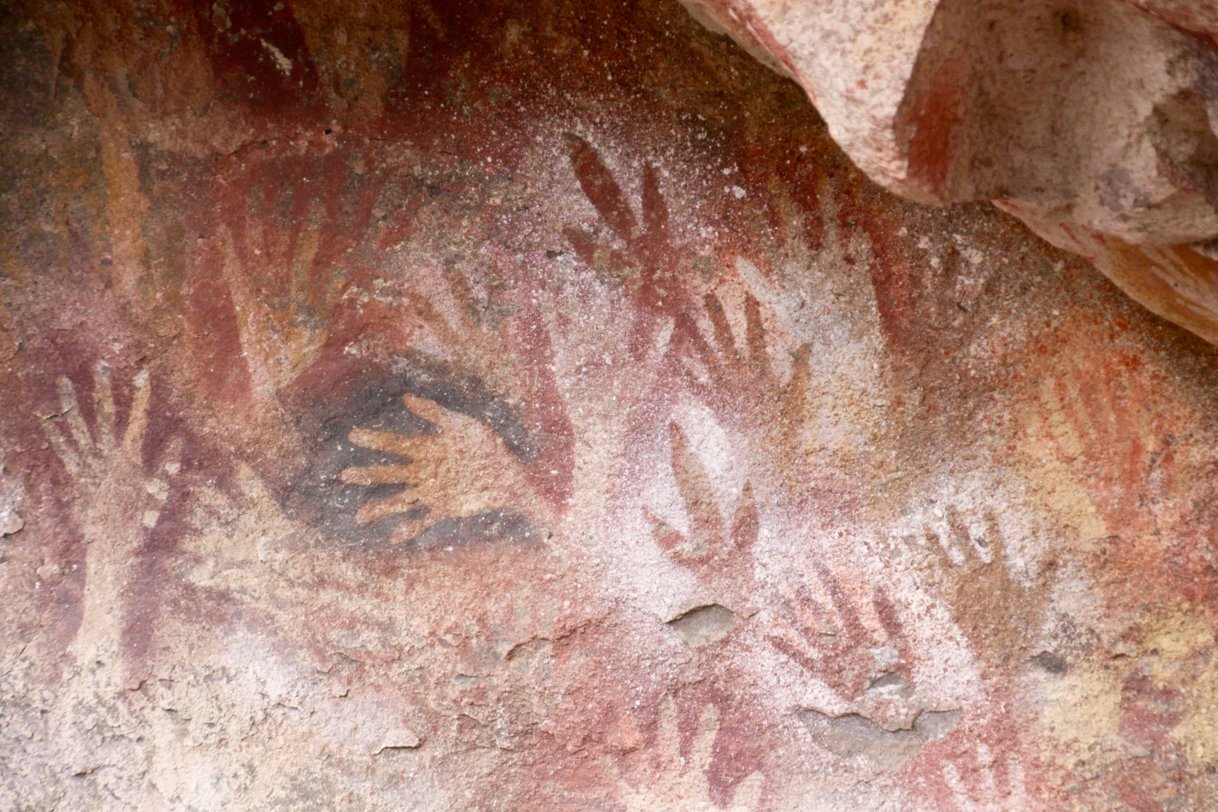Hand prints on the walls of Cueva de Las Manos