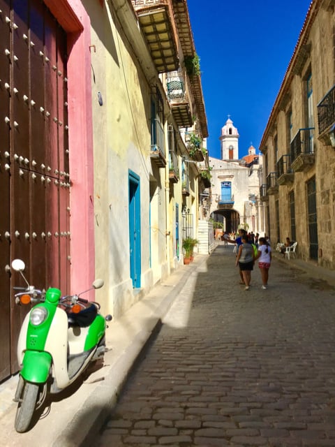 Colourful street scene on a walking tour of Havana.