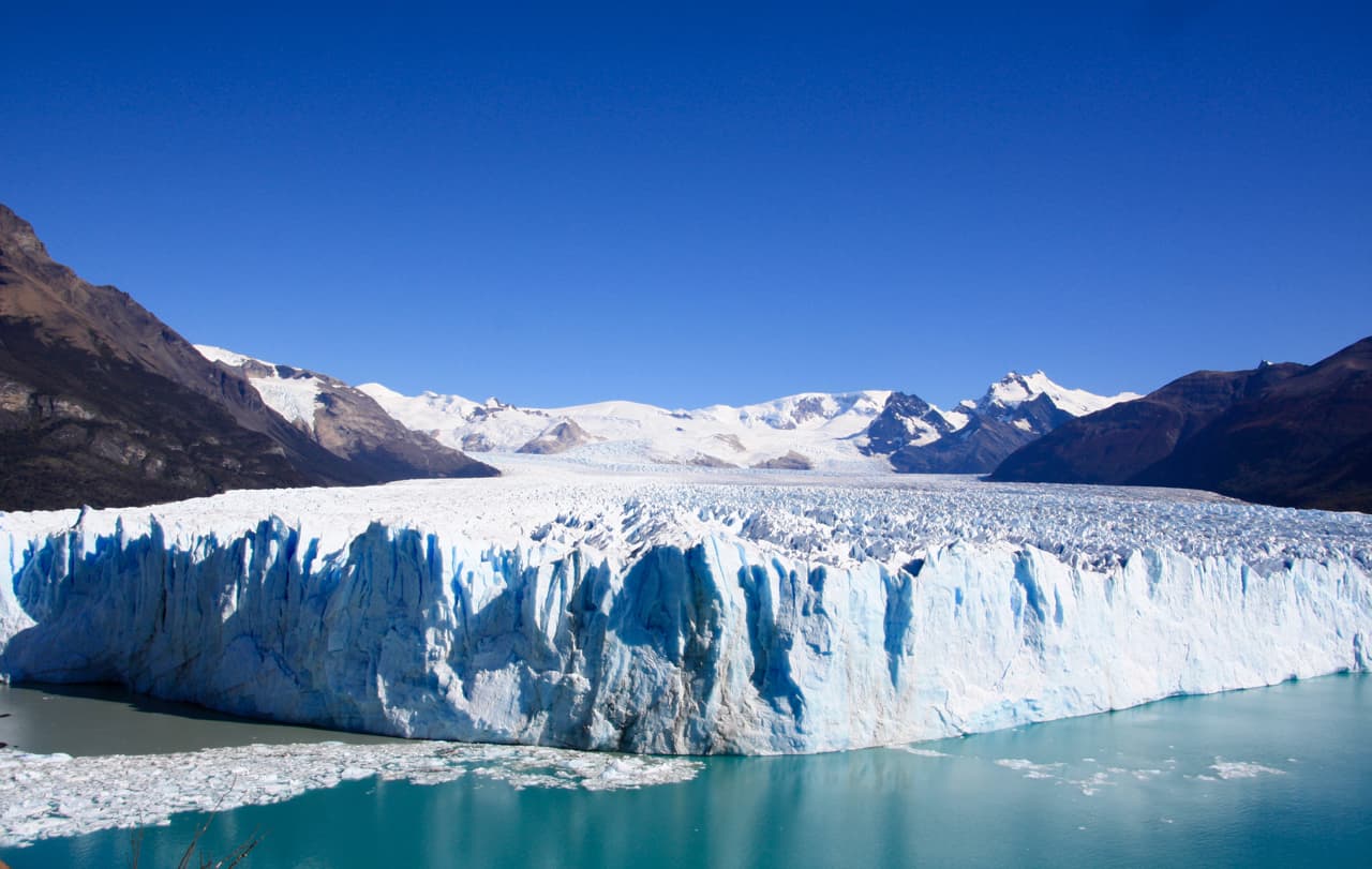 Looking towards the towering icy wall of Perito Moreno Glacier. 