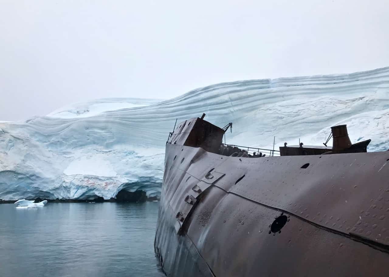 The 1915 wreck of the whaling factory ship Governoren rests on its side at Foyn Harbour in Antarctica. 