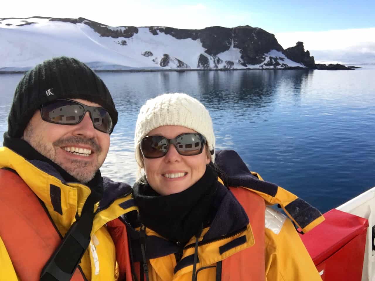 Couple on a ship arriving in Antarctica.