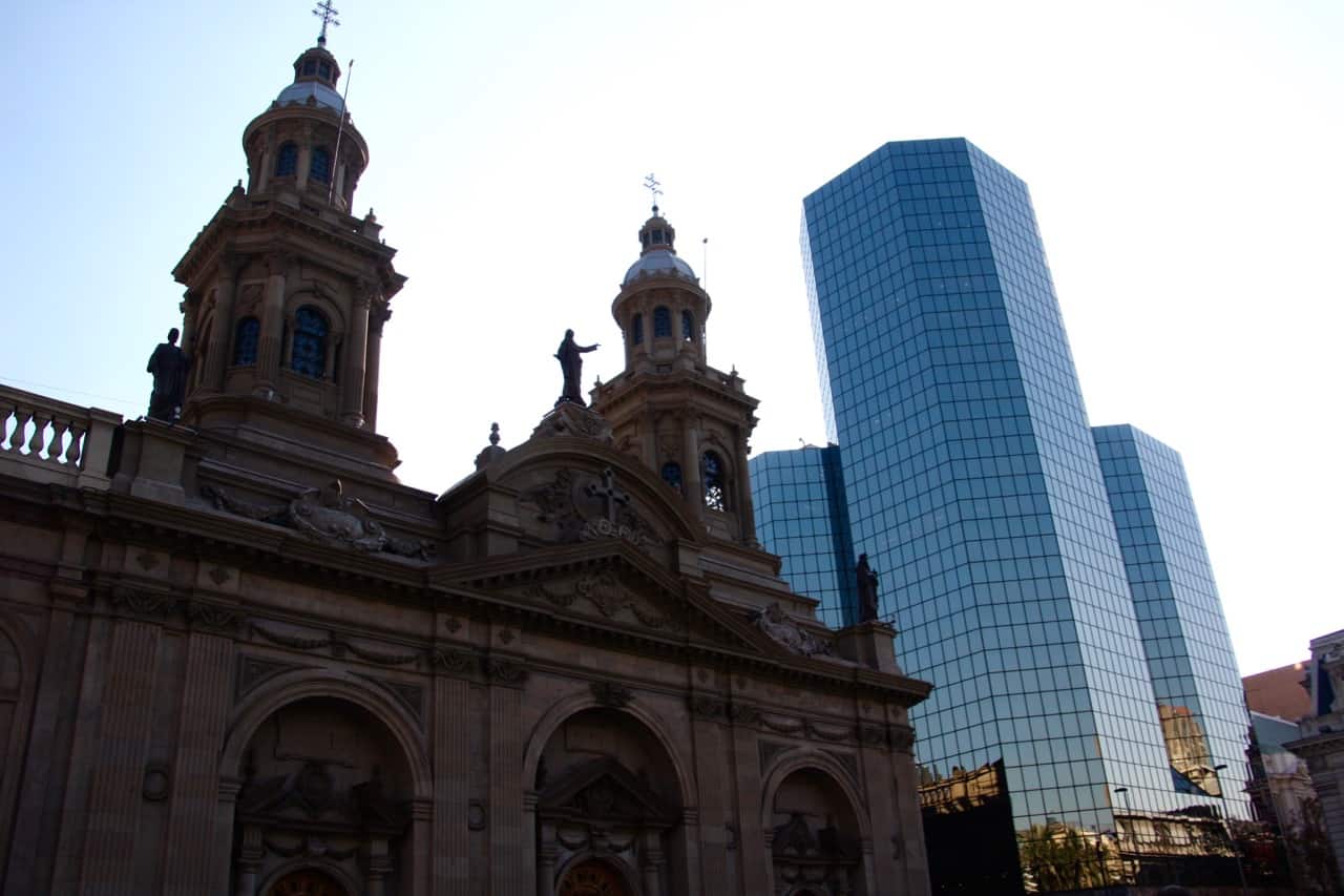 Top things to do in Santiago - Cathedral Metropolitana in Santiago, surrounded by high rise buildings