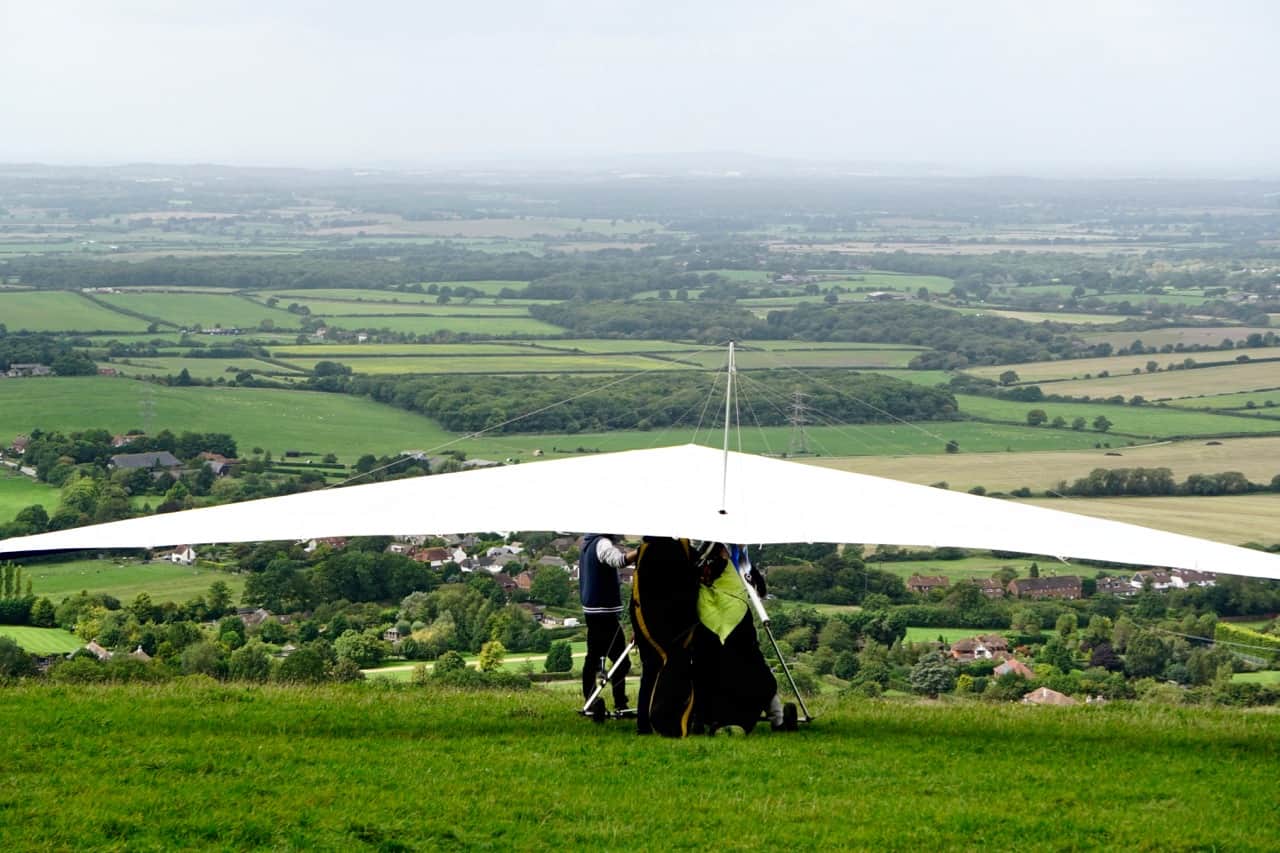 East Sussex Road Trip – a hang glider readies for take off