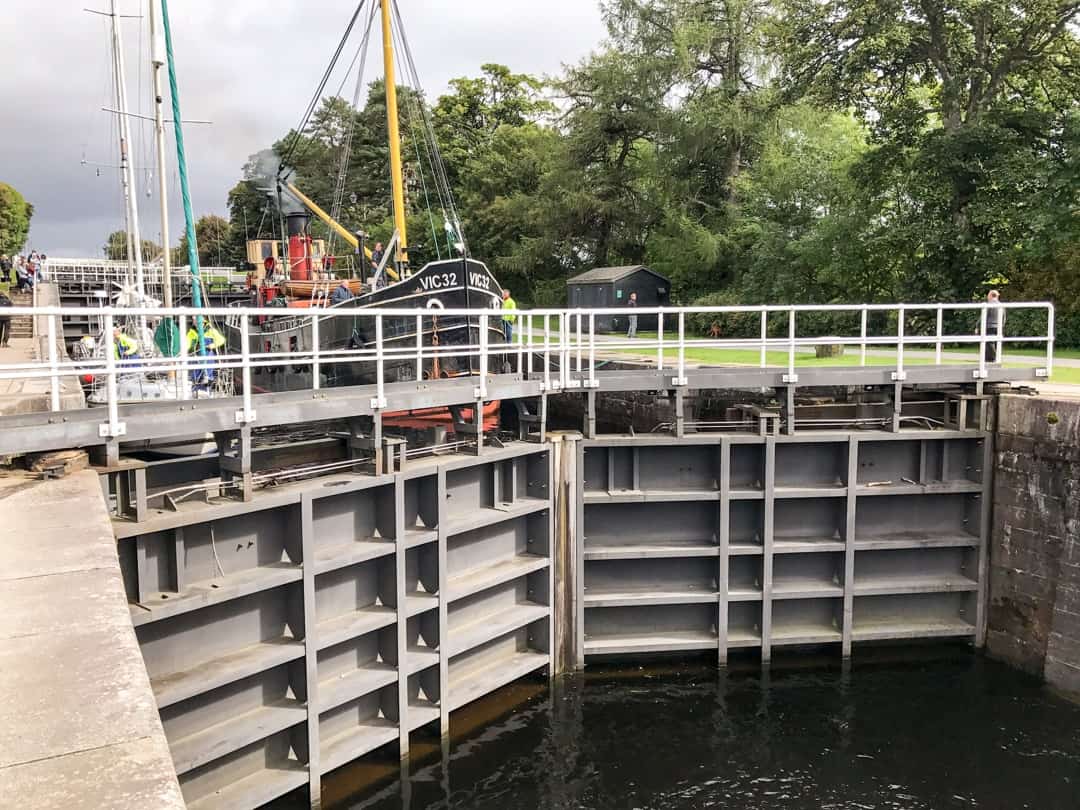 Boats gather in a lowering lock at Neptune's Staircase.