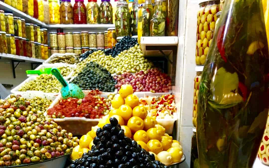 Marrakech old town - local shop selling olives and pickles