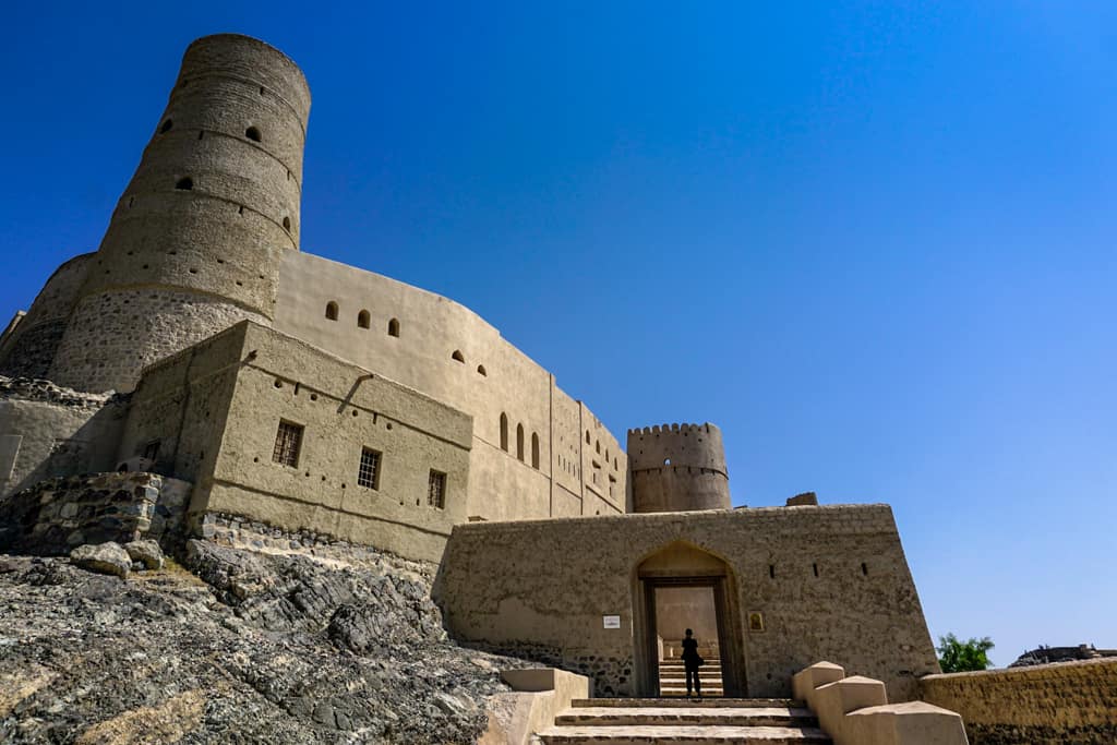 Oman Images – The imposing entrance to the Unesco listed Bahla Fort in Oman.