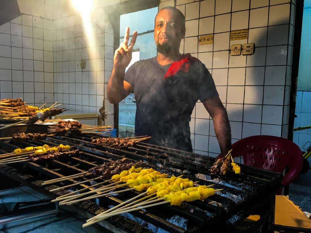 Skewers of meat and seafood roasted over hot coals at a mishkak stall is a great way to finish day 12 of our Oman itinerary.