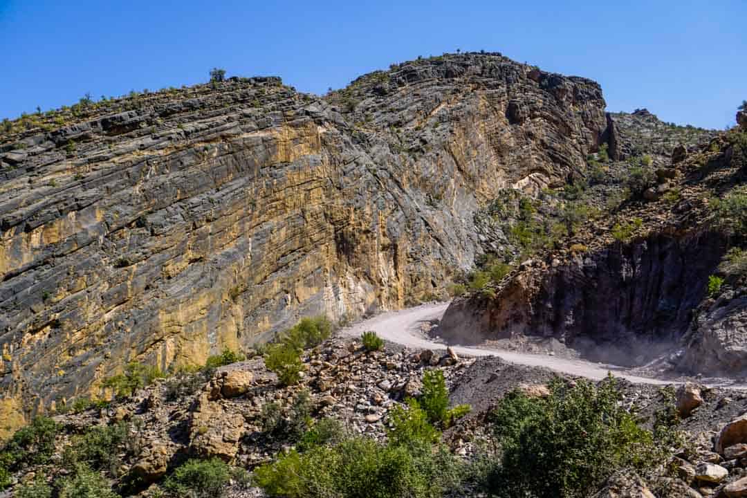 The narrow, sandy track across the Al Hajar Mountains is one of the great thrills of a self drive Oman trip.