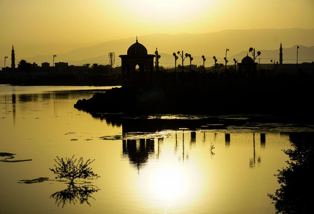 Late afternoon turns the lagoon in Sur golden on day 6 of our self drive Oman road trip.