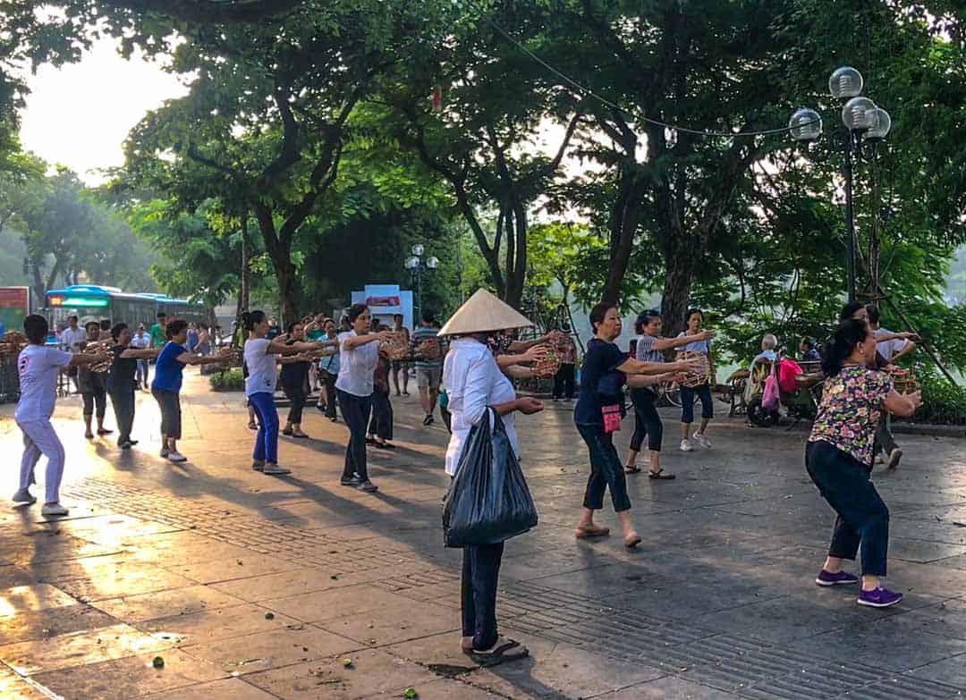 One Day In Hanoi - An early morning Tai Chi session by Hoan Kiem Lake.