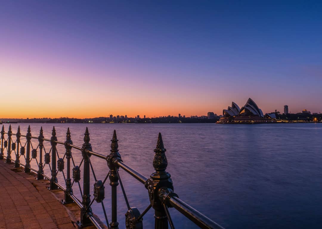 Purple And Orange Dawn Over Sydney Harbour And The Opera House.