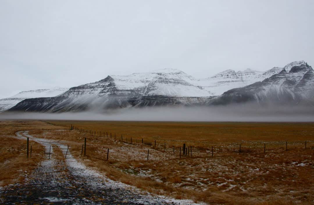 Self-drive Iceland - mist rises below the mountains of Snaefellsnes Peninsula