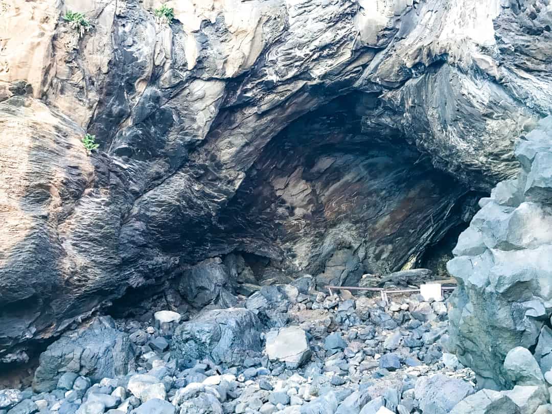 The entrance to Ana Kai Tangata, the cave where rock art paintings of birds adorn the walls.