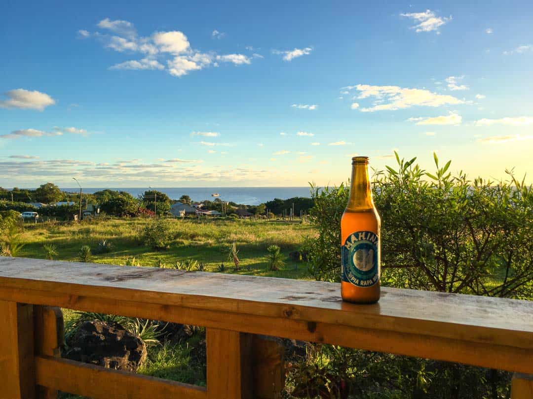 View of the sea with a local beer at Hareswiss, an Easter Island accommodation.