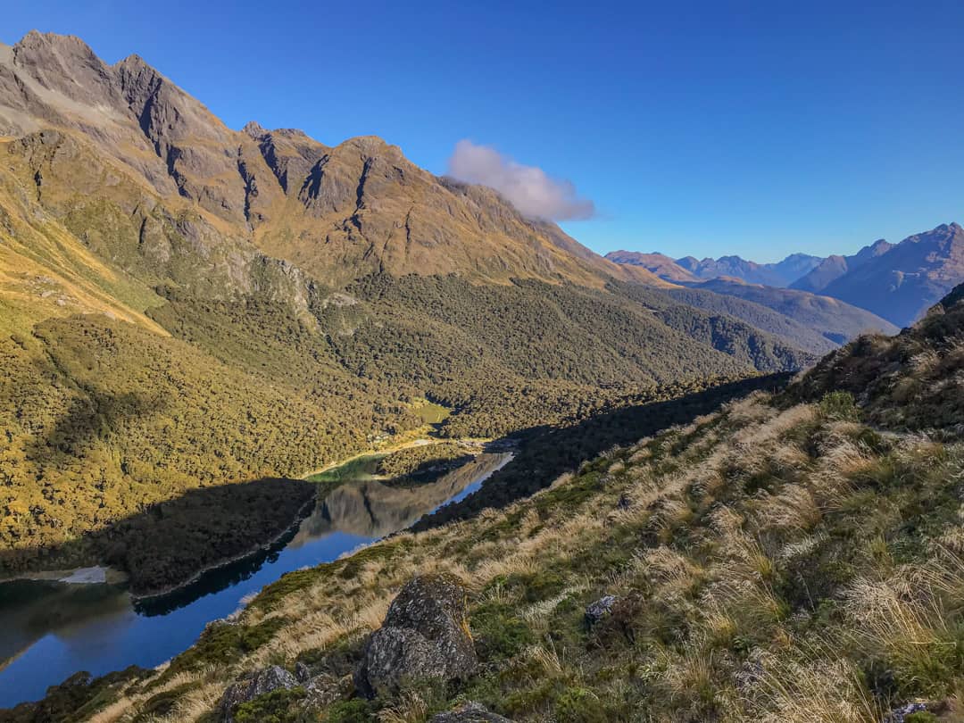 Dramatic Lake Mackenzie At The Base Of Mountains: A Highlight Of Hiking New Zealand South Island.