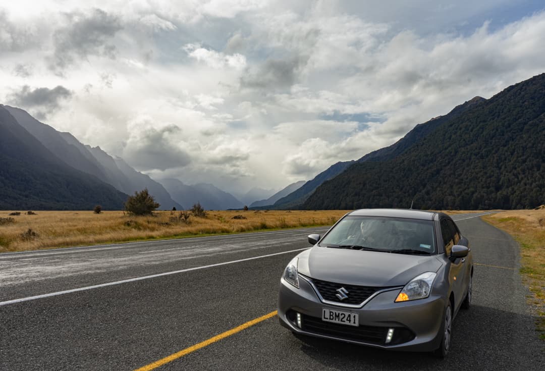 Car and Views On The Te Anau-Milford Highway.