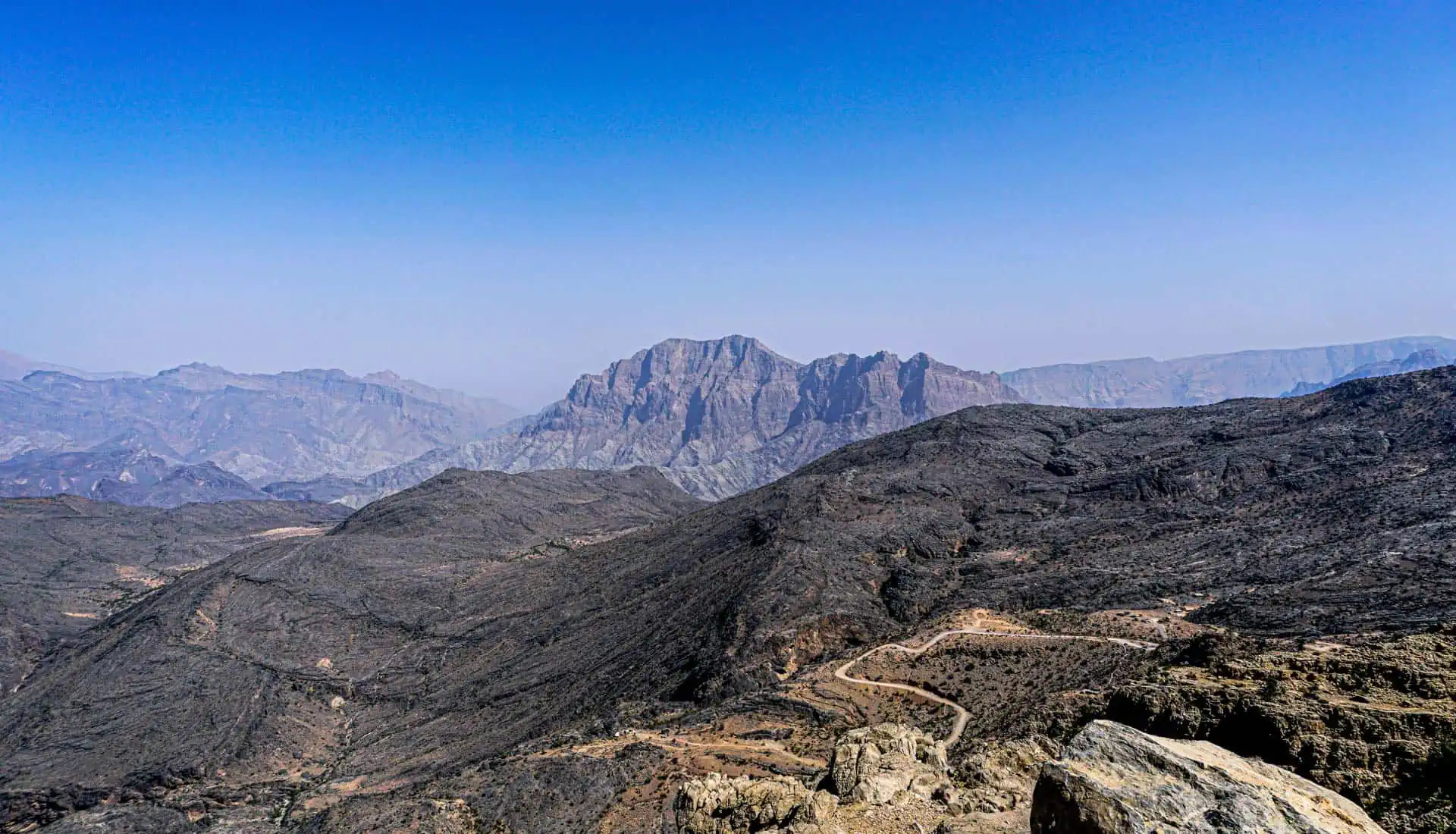 Enjoy jaw dropping views when you take the off-road route across the Al Hajar Mountains in Oman.