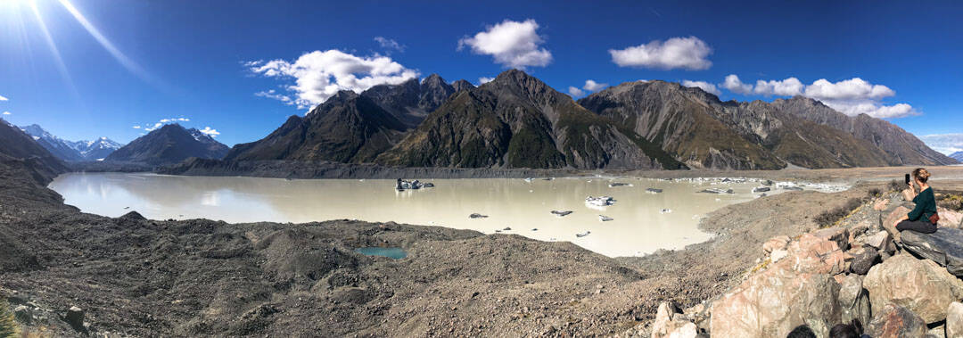 Icebergs float on chocolatey milk Tasman Lake.