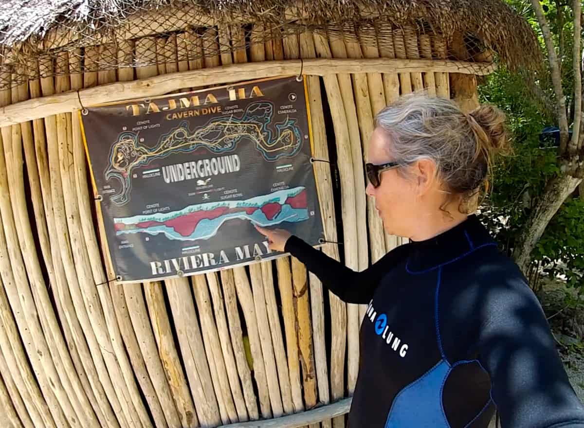 Looking at a map of Tajma Ha cenote during our pre-dive briefing.