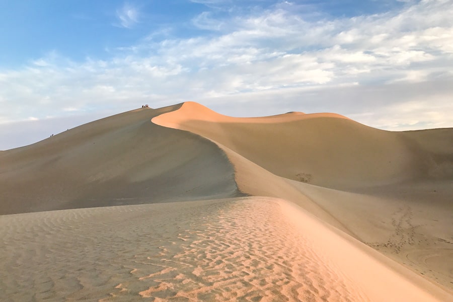 Tour Iran and visit the incredible desert dunes near Varzaneh