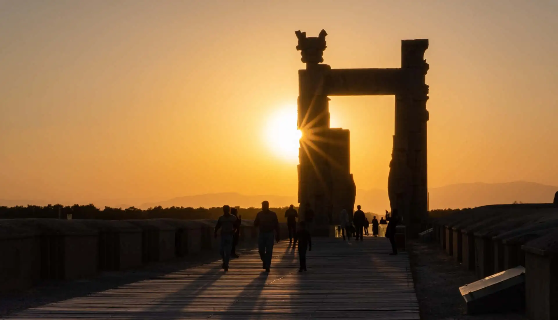 Sunset at the Gate of All Nations at Persepolis will stay in our memories for a long time, and tops the list of incredible things to do in Iran.