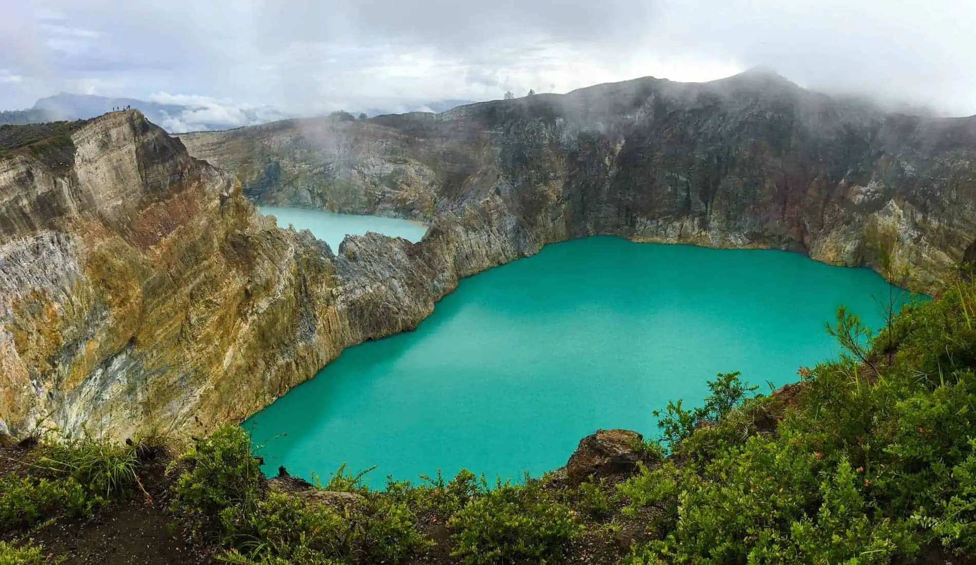 A moody sunrise overlooking Kelimutu’s crater lakes was a huge highlight of our two week Flores itinerary.