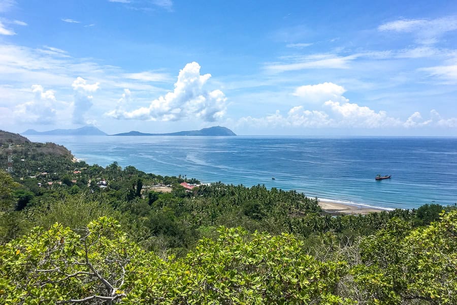 A sunny day with sweeping coastal views and distant islands – a frequent occurrence on Flores tours.