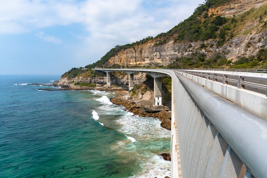 Australian-Road-Trips: Seacliff Bridge hugs the cliff south of Sydney.