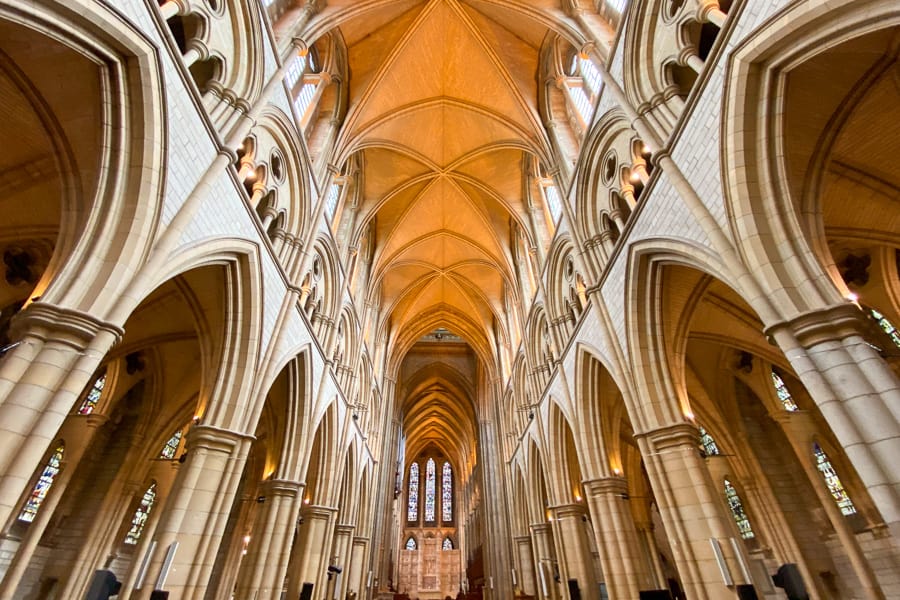 Tall arches rise to a vaulted ceiling in Truro Cathedral.