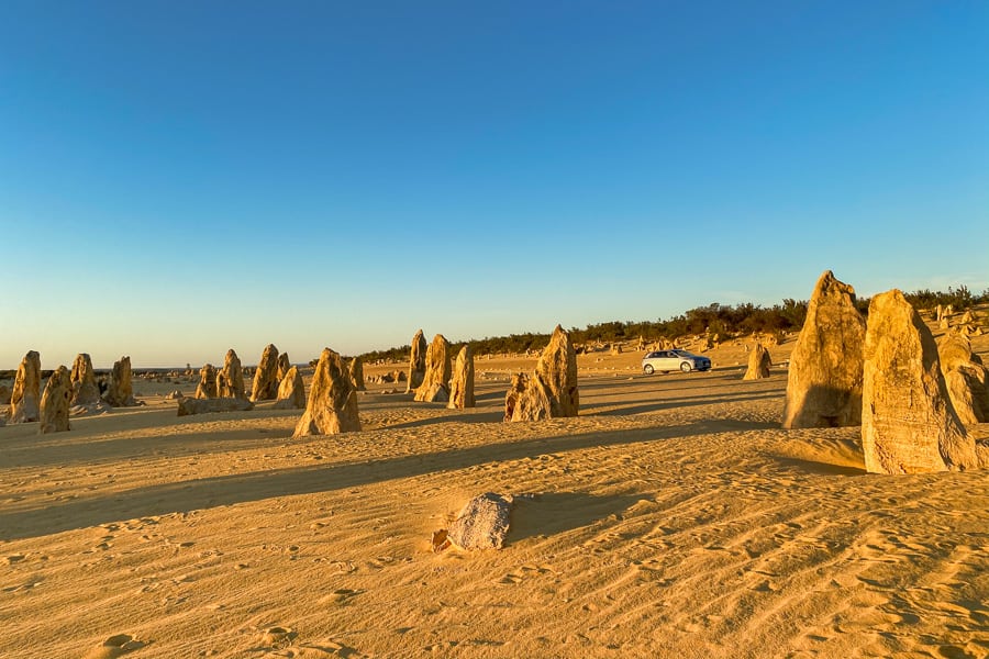 Driving through the Pinnacles at sunset makes for a magical Perth road trip.
