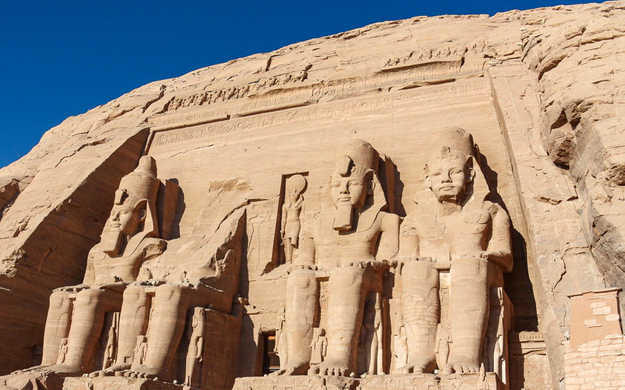 View of the four colossal statues of Ramses II at Abu Simbel, one of the best Egypt experiences.