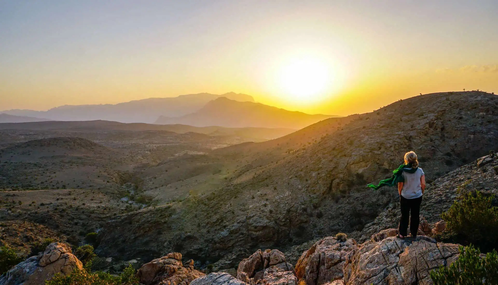 Spectacular sunset across Jebel Shams, a real highlight of a two-week self-drive Oman itinerary.