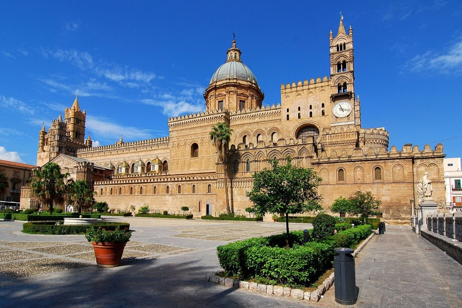 The golden stoned Palermo Cathedral is a top stop on a 14 Day Sicily Itinerary.  