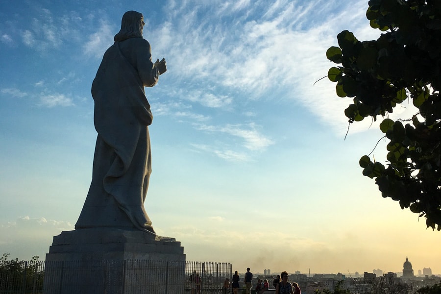 Sunset at the huge Cristo de Habana statue over Havana’s skyline on Day 3 of our Cuba 2 week itinerary.