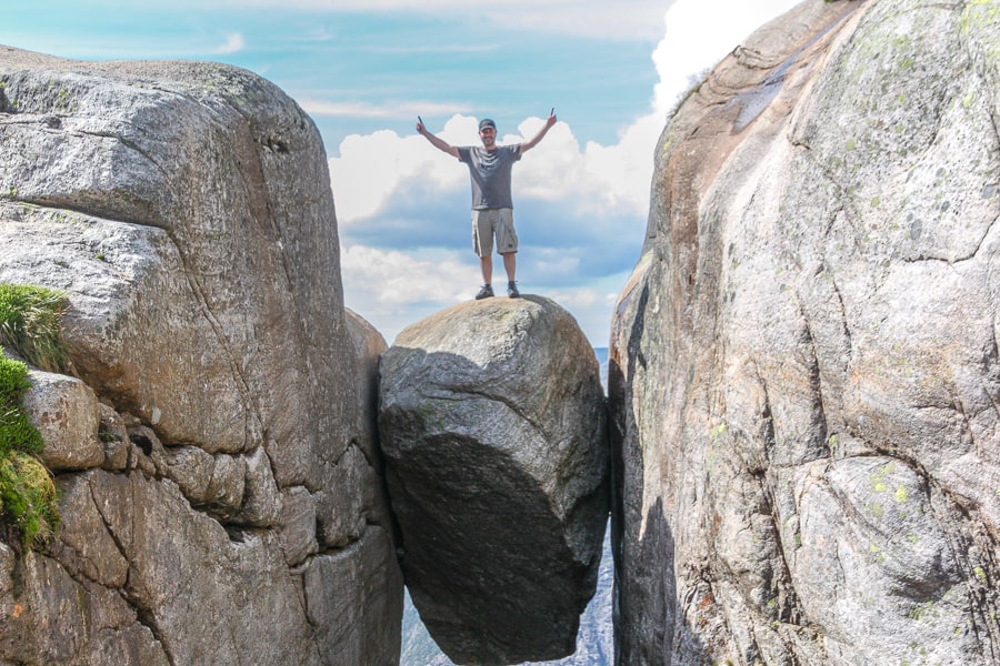 Standing on top of Kjeragbolten 984 metres above Lysefjord is a highlight of our Norway road trip itinerary.