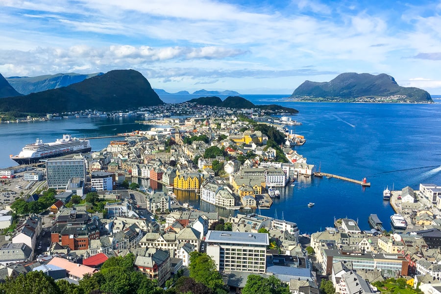 Spectacular views over colourful Alesund on a sunny day from Aksla Viewpoint as part of our Norway 14 day itinerary.
