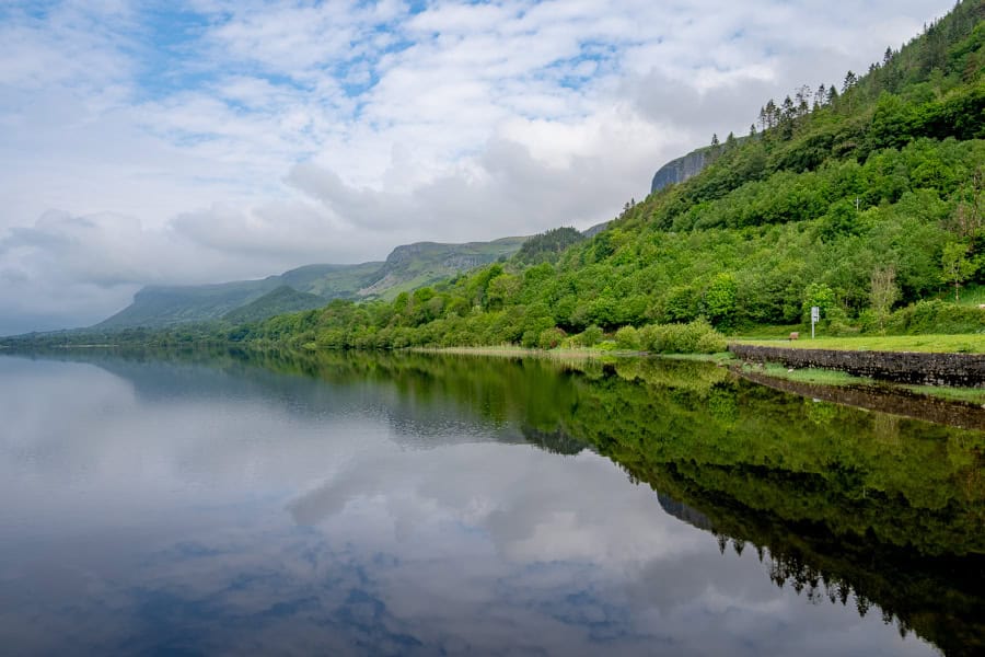Views across the calm waters of Glencar Lough towards Benbulben Mountain.