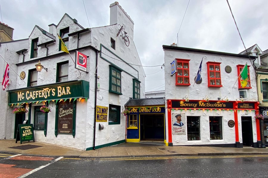 A couple of colourful pubs on Donegal’s main street beckon on a blustery wet day.
